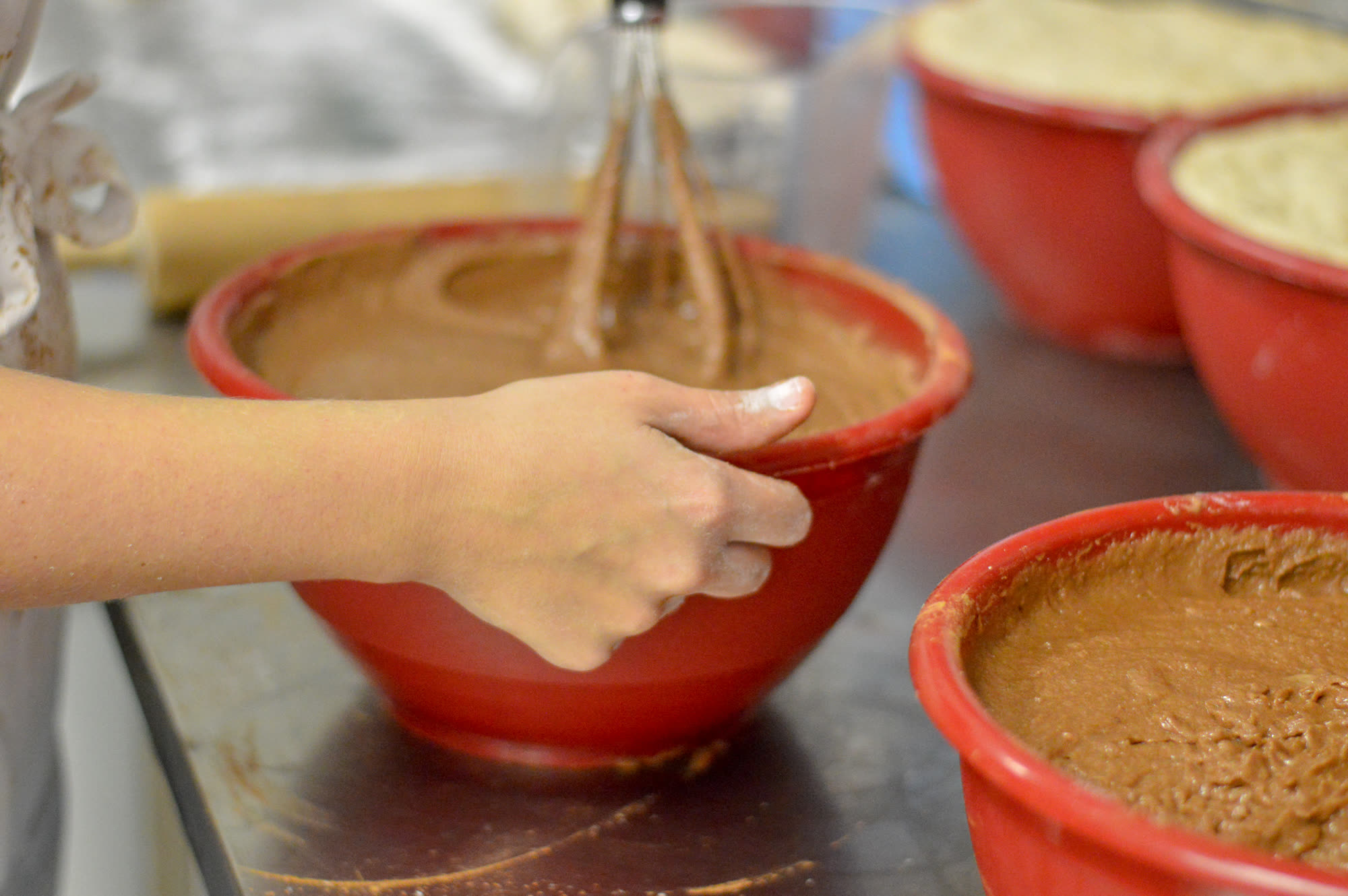 Mixing cinnamon roll dough by hand from scratch